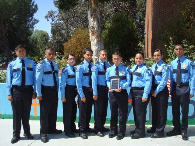Baldwin Park Police Department Police Explorers with a Plaque